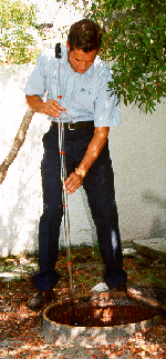 An Environmental Biotech technician services a Sugar/Starch Eradication System